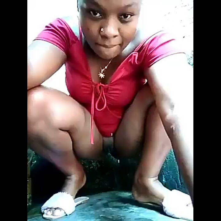African woman squirting outdoors video.