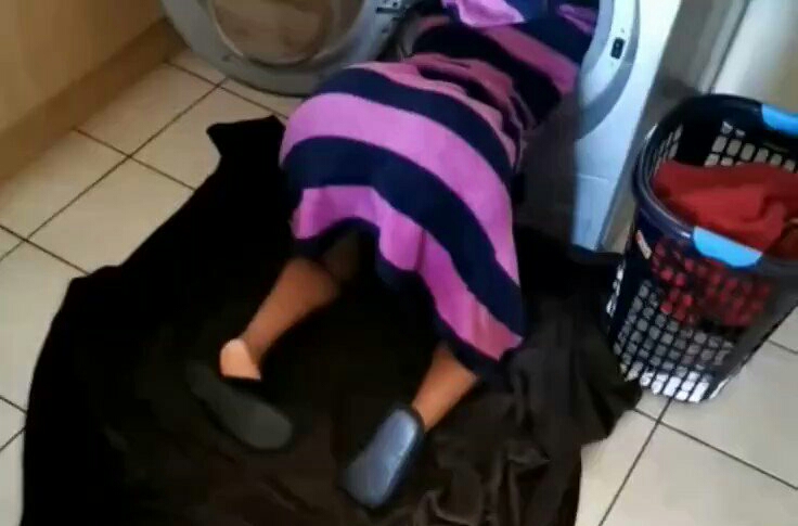 Angie stuck on washing machine.