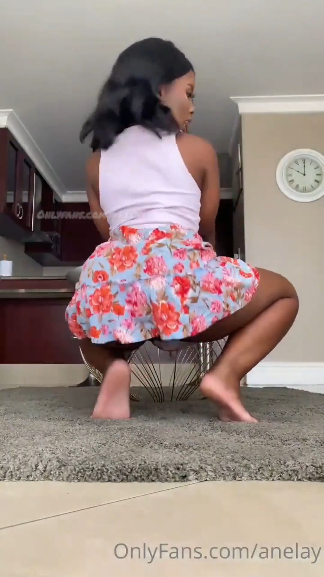 The twerk of a girl in a short dress